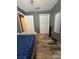 Bedroom featuring wood-look floors, closet, ceiling fan and natural light at 11 Pecan Run Ct, Ocala, FL 34472