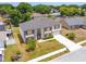 This home features beautiful landscaping, a pristine lawn, and an ideal location in a picturesque neighborhood setting at 114 Shaddock Dr, Auburndale, FL 33823