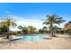 Community pool, and beautiful landscaping at 1161 Trappers Trail Loop, Davenport, FL 33896