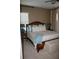 Comfortable bedroom featuring a king bed, neutral colors, and soft lighting, promoting relaxation at 12030 Waterstone Loop Dr, Windermere, FL 34786