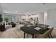 Spacious living room that flows into the kitchen with modern appliances, perfect for entertaining or relaxing at 13068 Sw 36Th Ct, Ocala, FL 34473