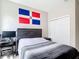 Bedroom featuring a flag, double closet and desk at 13297 Sw 69Th Pl, Ocala, FL 34481