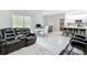 Open concept design of living, kitchen and dining space featuring lots of natural light at 13297 Sw 69Th Pl, Ocala, FL 34481