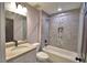 Upgraded bathroom with modern vanity, toilet, and tiled shower showcasing design features and functionality at 1390 E Wabash St, Bartow, FL 33830