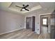 Bedroom with wood floors, walk in closet, and ceiling fan at 1390 E Wabash St, Bartow, FL 33830
