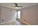 Bedroom with luxury vinyl flooring and a window at 1390 E Wabash St, Bartow, FL 33830