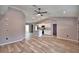 Spacious open-concept living room featuring recessed lighting, kitchen island and hard surface flooring at 1390 E Wabash St, Bartow, FL 33830