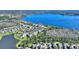 Breathtaking aerial view of lakeside community with waterfront homes and private boat docks at 14906 Speer Lake Dr, Winter Garden, FL 34787