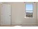 Bedroom with hardwood floors, water view and natural light at 14906 Speer Lake Dr, Winter Garden, FL 34787