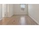 Bedroom with hardwood floors, access to a bathroom and natural light at 14906 Speer Lake Dr, Winter Garden, FL 34787