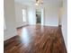 Spacious bedroom with beautiful dark wood floors and bright white trim at 14906 Speer Lake Dr, Winter Garden, FL 34787