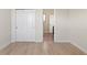 Bedroom features hardwood floors, closet, and access to a bathroom at 14906 Speer Lake Dr, Winter Garden, FL 34787