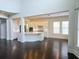 Modern kitchen features white cabinets, an island, and hardwood floors at 14906 Speer Lake Dr, Winter Garden, FL 34787