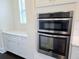 Kitchen with built-in stainless steel microwave and oven at 14906 Speer Lake Dr, Winter Garden, FL 34787