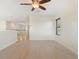 Bright living room featuring hardwood floors, stairs and an open floor plan at 14906 Speer Lake Dr, Winter Garden, FL 34787