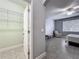 Bedroom featuring light walls, ceiling fan, tile floors, window and walk-in closet at 17146 Cypress Preserve Pkwy, Orlando, FL 32820