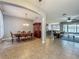 Open-concept dining area flows to living areas for easy entertaining at 17146 Cypress Preserve Pkwy, Orlando, FL 32820