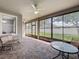Spacious screened lanai with brick flooring and a ceiling fan at 17146 Cypress Preserve Pkwy, Orlando, FL 32820