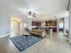 Expansive living area that combines living, dining, and kitchen spaces for modern living at 17146 Cypress Preserve Pkwy, Orlando, FL 32820