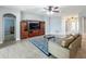 Comfortable living room with stylish furniture and entertainment center, perfect for relaxation at 17146 Cypress Preserve Pkwy, Orlando, FL 32820