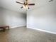Open living area with tiled floors and neutral paint at 17146 Cypress Preserve Pkwy, Orlando, FL 32820