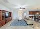Spacious living area seamlessly connects to the kitchen, creating an inviting and social atmosphere at 17146 Cypress Preserve Pkwy, Orlando, FL 32820