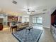 Open floor plan with living, dining, and kitchen area, perfect for entertaining and Gathering gatherings at 17146 Cypress Preserve Pkwy, Orlando, FL 32820