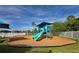 A community playground with slides and play equipment, set against a blue sky at 17146 Cypress Preserve Pkwy, Orlando, FL 32820