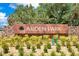 Arden Park community sign set in a stone wall surrounded by manicured landscaping at 1780 Southern Red Oak Ct, Ocoee, FL 34761