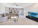 Upstairs living room featuring modern furniture and a view at 1780 Southern Red Oak Ct, Ocoee, FL 34761