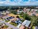 Aerial view of a residential neighborhood with mature trees and well-maintained homes at 17816 Se 115Th Ct, Summerfield, FL 34491