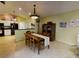 Dining room features stylish light fixture and dining set at 17816 Se 115Th Ct, Summerfield, FL 34491
