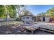 Large backyard with a patio and a firepit area at 1809 Pineview Cir, Winter Park, FL 32792