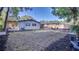 Spacious backyard with a cozy patio area, perfect for outdoor gatherings and relaxation at 1809 Pineview Cir, Winter Park, FL 32792