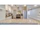 Modern kitchen featuring granite countertops, stainless steel appliances, and mosaic backsplash at 1809 Pineview Cir, Winter Park, FL 32792