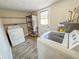 Functional laundry room with appliances, storage, and direct outdoor access at 1809 Pineview Cir, Winter Park, FL 32792