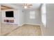 Bright living room with tiled floors, wood trim, and natural light at 1809 Pineview Cir, Winter Park, FL 32792