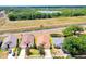 Aerial view of the property, showcasing its location near a lake and green spaces at 19756 Glen Elm Way, Orlando, FL 32833
