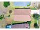 An aerial view shows the roof and trees surrounding the home at 19756 Glen Elm Way, Orlando, FL 32833