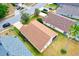 Aerial view shows a tan roof and large backyard in a friendly residential area at 19756 Glen Elm Way, Orlando, FL 32833