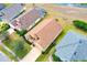 An overhead view reveals its roof and verdant surroundings in a serene neighborhood at 19756 Glen Elm Way, Orlando, FL 32833