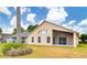 View of the backyard and covered lanai, offering outdoor enjoyment and relaxation at 19756 Glen Elm Way, Orlando, FL 32833