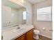 Clean bathroom with a vanity, mirror, and a combined tub and shower space at 19756 Glen Elm Way, Orlando, FL 32833