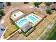 A beautiful community pool area with a playground and lounge chairs at 19756 Glen Elm Way, Orlando, FL 32833