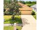 A lovely single-Gathering home features a well-kept lawn and attached two-car garage at 19756 Glen Elm Way, Orlando, FL 32833