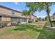 Spacious backyard with a well-maintained lawn and green landscaping, perfect for outdoor activities at 212 Belvedere Way, Sanford, FL 32773