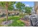 Backyard featuring mature trees and landscaping providing privacy and shade at 212 Belvedere Way, Sanford, FL 32773