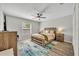 Bright bedroom with a ceiling fan, stylish rug, and lots of natural light at 212 Belvedere Way, Sanford, FL 32773