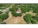 Aerial view of a single Gathering home with large yard and mature trees in a residential neighborhood at 21343 Reindeer Rd, Christmas, FL 32709