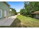 Large backyard with shed and plenty of space for outdoor activities at 21343 Reindeer Rd, Christmas, FL 32709